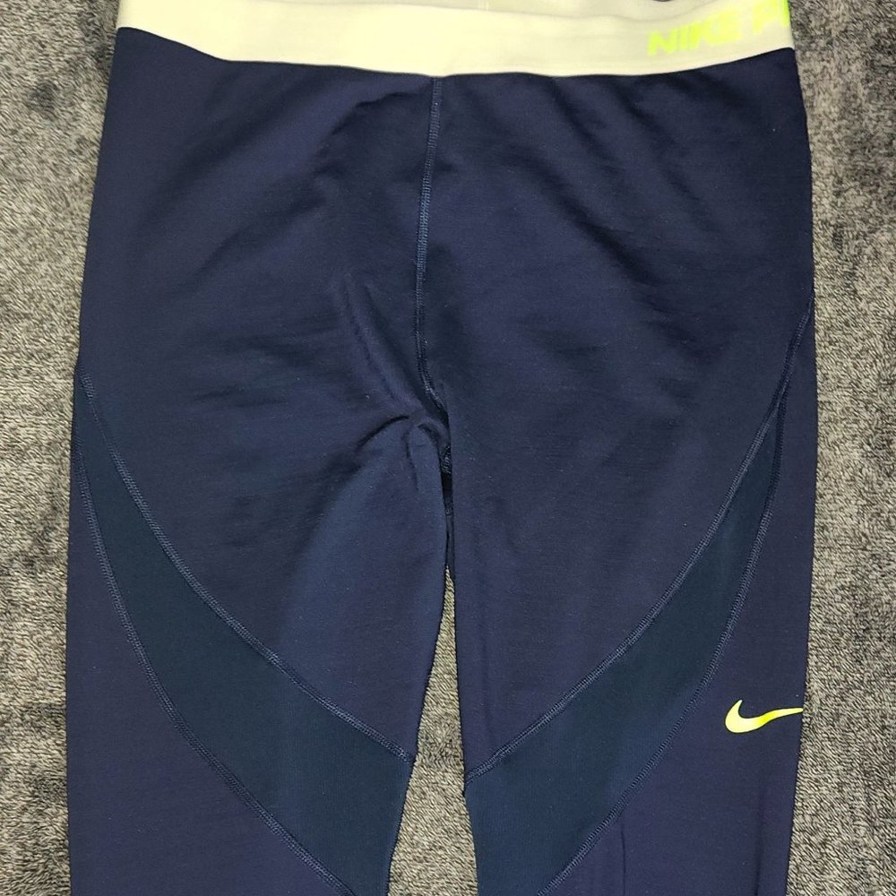 NIKE Pro Ladies' stylish athletic stretch pants, Dark Blue and white in size 1XL